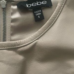 Brand new small blouse , ivory lether material